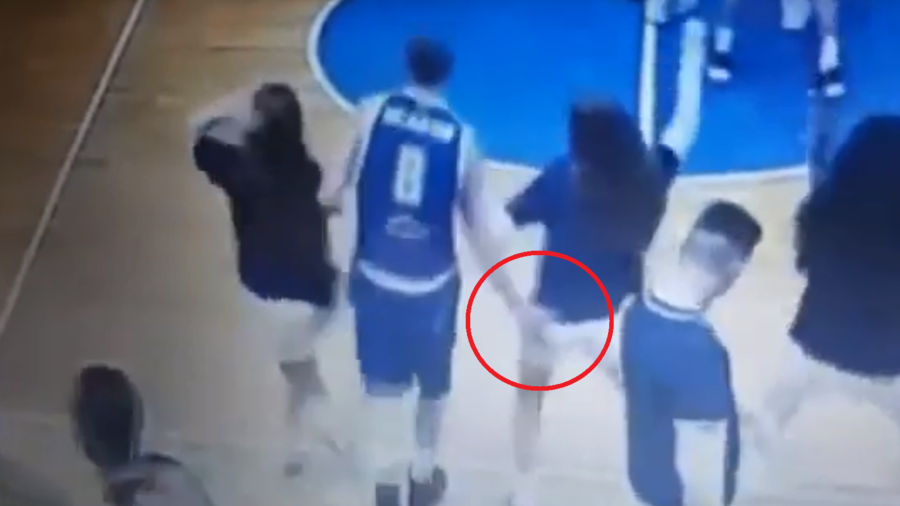 ‘He delicately moved her aside’: Basketball team backs captain who pinched cheerleader’s bum (VIDEO)