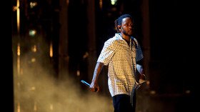 Rapper Kendrick Lamar leads Grammy award nominations with 8 nods, Drake has 7