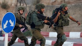 ‘Force, intimidation & tear gas’: IDF raids Palestinian news agency to ‘grab CCTV footage’