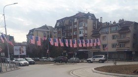 US & Serbian flags color opposite sides of Mitrovica as Kosovo votes to create army (PHOTO)