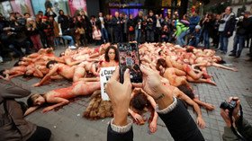 Naked & bloodied activists depict pile of skinned animals in shock Barcelona flashmob (VIDEO)