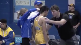 Referee under fire after forcing black high school wrestler to cut off dreads (VIDEO)