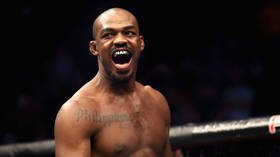UFC champ Jon Jones charged with battery after 'placing waitress in chokehold at strip club'