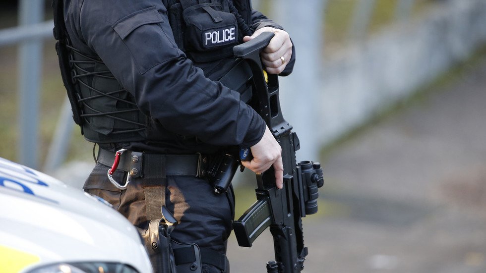 Armed police arrest man with large sword at English train station ...