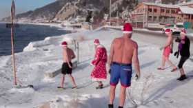 Meanwhile in Russia: Ice swimmers cheerfully plunge into chilly Lake Baikal (VIDEO)
