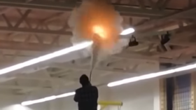 Playground from hell: Russian mall staff put out fire with kids running around (VIDEO)