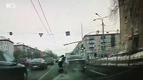 Russian driver drags policeman along road, crashes & gets run over (VIDEO)