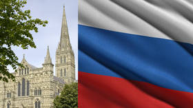 Trolling Russia, or mocking British paranoia? HUGE Russian flag flies from Salisbury Cathedral