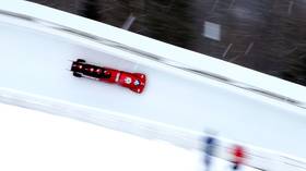 WATCH: Horror moment track worker comes INCHES from being taken out by bobsleigh at breakneck speed