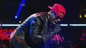 R Kelly charged with 10 counts of aggravated criminal sexual abuse