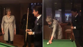 ‘Another balls-up’: Theresa May ridiculed after awkward pool game with Italian PM (VIDEO)