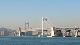 Russian cargo ship CRASHES into road bridge in South Korea (VIDEO)