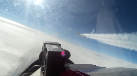 Su-27 intercepts & chases US spy plane away from Russia’s borders (VIDEO)