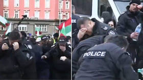WATCH Bulgarian policemen use pepper spray against protesters…but wind blows it back in their faces