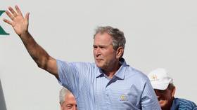 'Putter off the tee?' George W. Bush claims hole-in-one... but not everyone is convinced