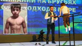 Mini Chechen muscleman sets latest record with incredible dips feat (VIDEO)  