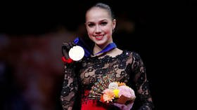 Pretty in pink: Russian figure skating star Medvedeva wows fans with latest outfit