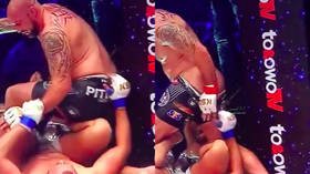 Cheeky move! Frustrated MMA fighter pulls down opponent's trunks during fight (VIDEO)