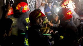 Trapped workers leap from building as huge fire rips through Bangladesh office block (VIDEOS)