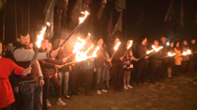Poland’s far-right holds torchlight procession, decries ‘gender ideologies’ (VIDEO)