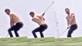 'Shot of the year': American golfer goes topless and sinks impossible eagle from the water