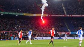 Feyenoord ultras defy fireworks ban... by shooting fireworks into own stadium (VIDEO)