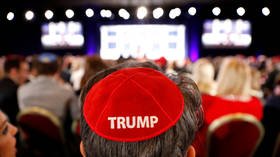 ‘This is unholy’: Twitter aghast as red Trump yarmulkes sported at Jewish event