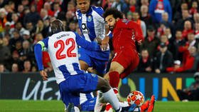 'A red all day long!': Salah shockingly escapes sending off for UCL horror tackle (PHOTOS/VIDEO)