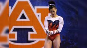 Whoosh! British gymnast Dominick Cunningham nails an amazing front flip basketball trick shot