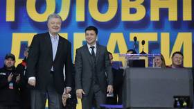 Weary Ukrainian voters face ultimate choice between comedian & politician