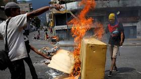 VIDEOS appear to show Venezuelan military CLASH, make arrests after pro-Guaido group splits