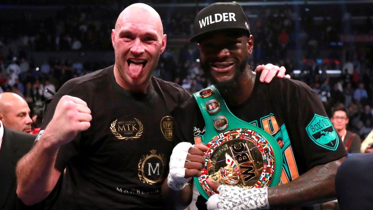 Tyson Fury and Deontay Wilder after their controversial draw © Reuters / Andrew Couldridge