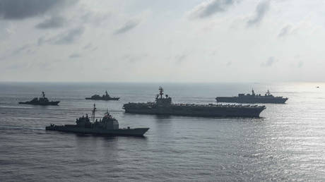 FILE PHOTO The Ronald Reagan Strike Group ship's aircraft carrier USS Ronald Reagan conduct an exercise with the Japanese Maritime Self-Defense Force ships © U.S. Navy/Handout via REUTERS/Mass Communication Specialist 2nd Class Kaila V. Peter