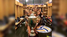 Cup a load of that! Italian volleyball players strip off with trophy to celebrate title win (PHOTOS)
