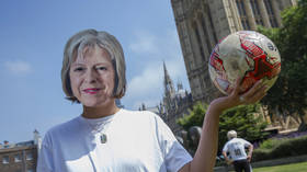 Midfields of wheat - British PM Theresa May hails English football's 'inspiration'