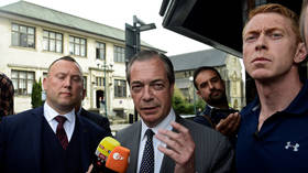 Gotcha? Irritated Farage tells confrontational Channel 4 reporter his bodyguards funded by Russians