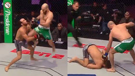 Ex-UFC Bisping makes hasty exit after jokingly hitting combo on giant Kazakhstani stuntman (VIDEO)