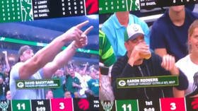 NFL superstar Aaron Rodgers loses out in beer-drinking competition during NBA playoffs (VIDEO)
