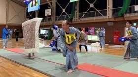 Togs away: Feathers fly in All-Japan Pillow Fighting Championships