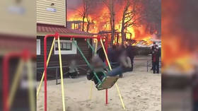 'He just wanted to swing’: Russian boy wins internet fame for priorities during RAGING FIRE (VIDEO)