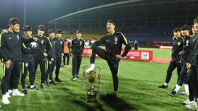 ‘Barbaric’: South Korean footballers stripped of China trophy over ‘foot on cup’ celebration