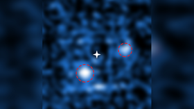 It's a planet! Two newborn exoplanets caught sucking in matter from distant star