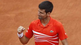 Djokovic eases into French Open semifinals with win over young pretender Zverev