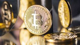 Bitcoin breaks key $10,000 mark, reaching 15-month high