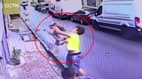 Teenager saves toddler from 2-story fall in spine-chilling VIDEO
