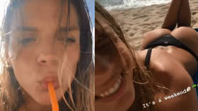 Peachy view! Russian swim star Efimova takes beach break ahead of World Championships (PHOTOS)