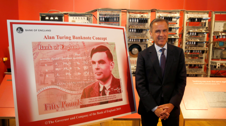 Bank of England governor Mark Carney presents the image of mathematician Alan Turing who will appear on a new 50 pound note at the Science and Industry Museum in Manchester, Britain, July 15, 2019. © Reuters / Andrew Yates