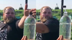 Bottle Slap Challenge! Russia's slapping champion 'Dumpling' creates own internet craze (VIDEO)