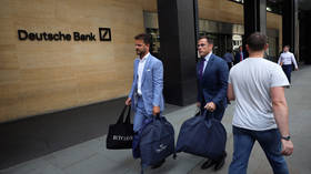 Perfect timing: Deutsche Bank bosses fitted for £1,500 suits as thousands of employees are laid off