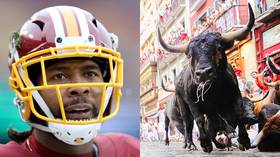 NFL star Josh Norman performs insane LEAP at 'Running of the Bulls' festival in Spain (VIDEO)
